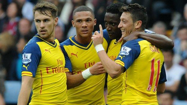 Arsenal celebrate during the victory at Aston Villa