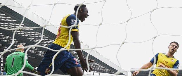 Arsenal striker Danny Welbeck shows his joy after scoring against Aston Villa