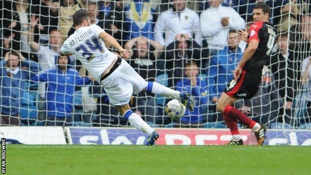 Mirco Antenucci scores the second goal in Leeds United's win over Huddersfield Town