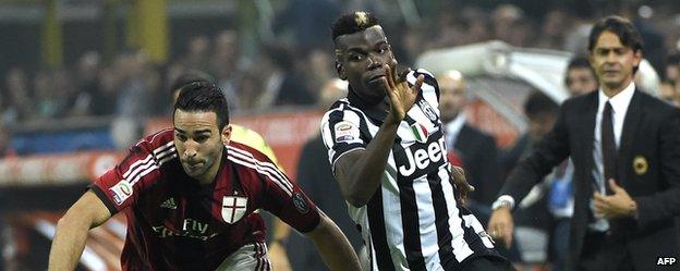 Paul Pogba and Adil Rami