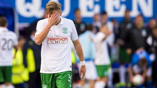 Dejection for Hibernian's Jason Cummings after his side is defeated by Queen of the South