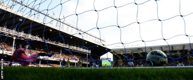 Leighton Baines scores from the penalty spot