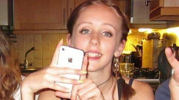 Alice Gross with her white iPhone 4 s