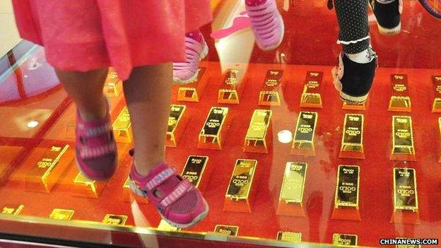 Walkway paved with gold bars at a shopping centre in Hubei province