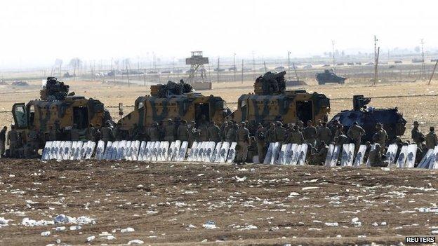 A Turkish soldier at the Turkey-Syria border