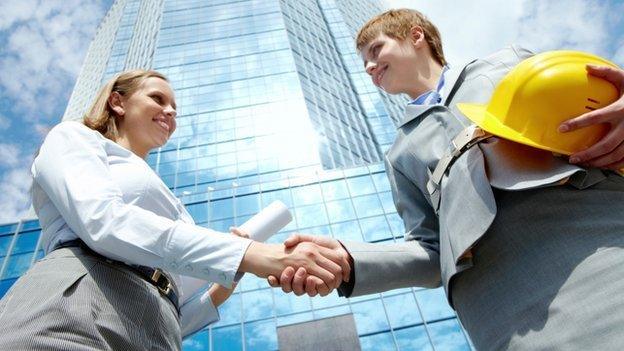 Professional women shake hands