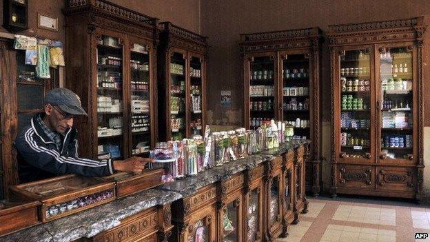 A man stands inside the Farmacia Centrale in Asmara, the capital of Eritrea, on 21 July 2013