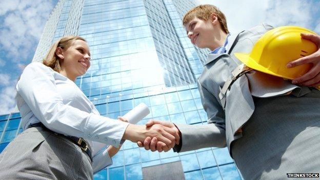 Professional women shake hands