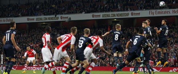 Alexis Sanchez scores Arsenal's opening goal