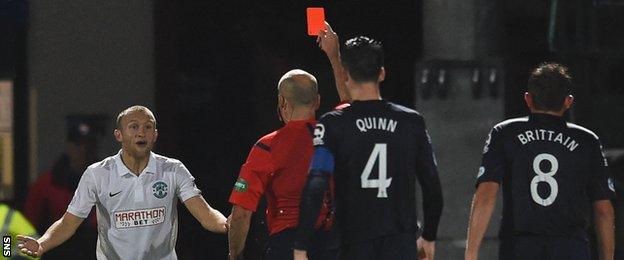 Hibernian midfielder Dylan McGeouch is sent off against Ross County