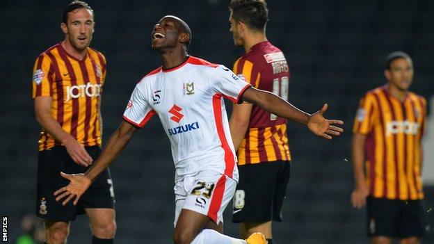 MK Dons' Benik Afobe celebrates after scoring their first goal