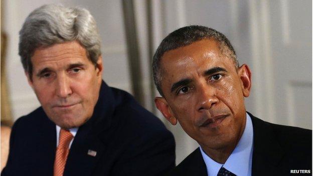 Picture of John Kerry and Barack Obama.