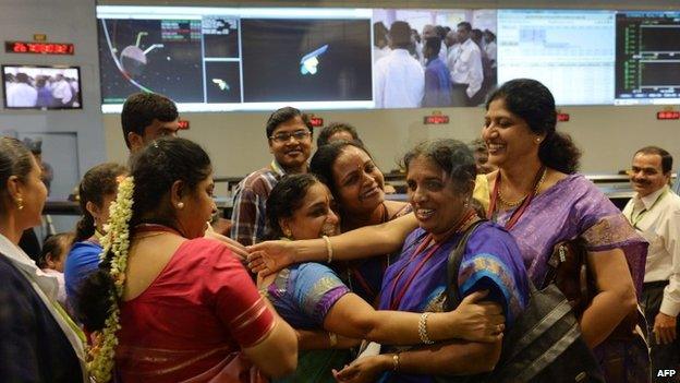 Staff from the Indian Space Research Organisation celebrate after the Mangalyaan probe's entry into orbit around Mars - 24 September 2014