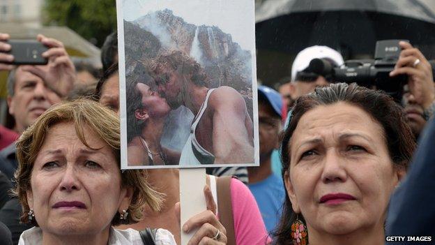 People gather in a demonstration to protest over the death of Monica Spear in Caracas on 8 January, 2014.