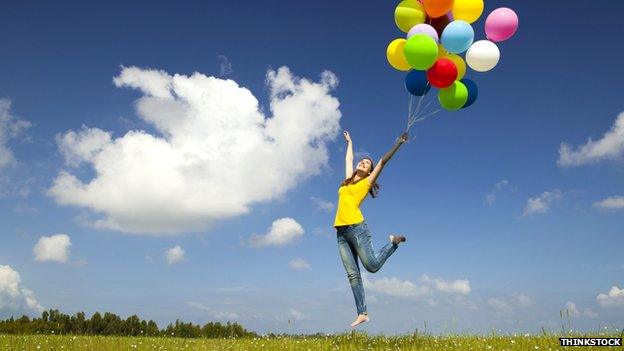 Woman with balloons