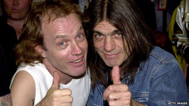 Angus Young and brother Malcolm Young of the Australian rock band AC-DC