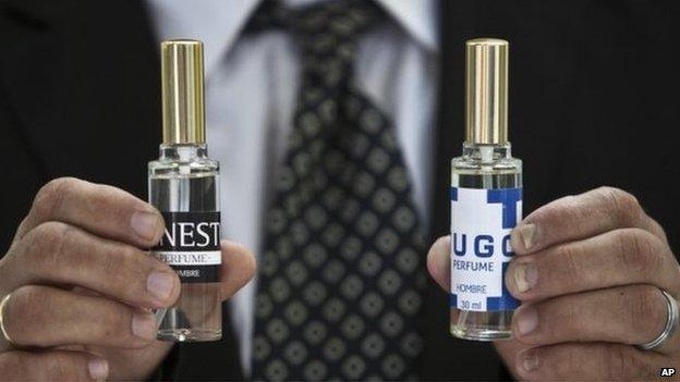 Bottles of the two scents, Hugo and Ernesto, being launched