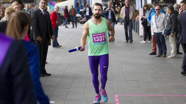 Shia LaBeouf runs in Amsterdam