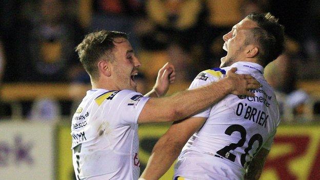 Gareth O'Brien congratulated by Warrington team-mate Richie Myler