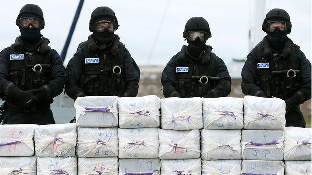 Irish navy officers stand guard over the cocaine haul