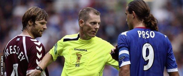 Scottish official Kenny Clark, centre, refereed the Cairo derby in 2001