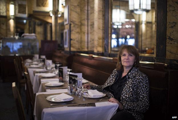 Sylvie Uderzo, the daughter of Albert Uderzo, poses on 4 June at the Vaudeville restaurant in Paris