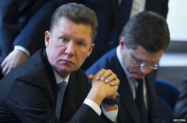 Gazprom CEO Alexei Miller (L) and Russian Energy Minister Alexander Novak wait for the start of gas talks between the EU, Russia and Ukraine in Berlin, 26 September