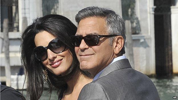 George Clooney and his fiancee Amal Alamuddin arrive in Venice