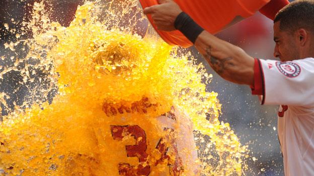 Gatorade being poured over a sportsman