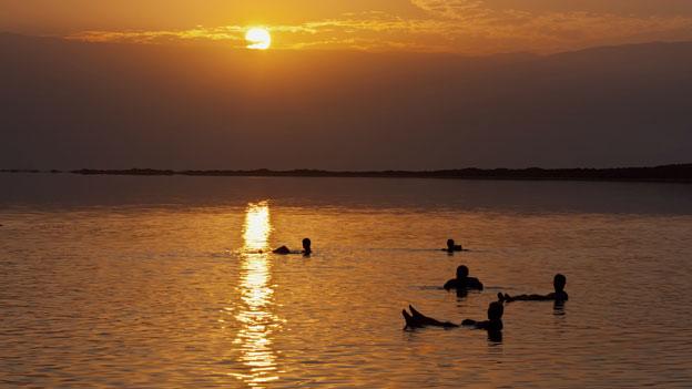 People swimming in the Dead Sea