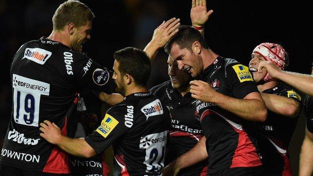 Gloucester players celebrate a try