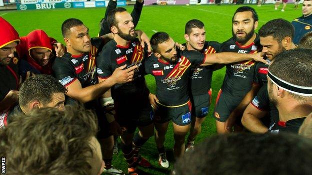 Catalans celebrate victory against Huddersfield.