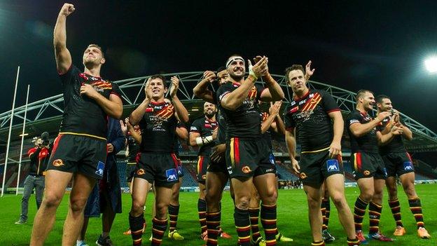 Catalans celebrate victory against Huddersfield.