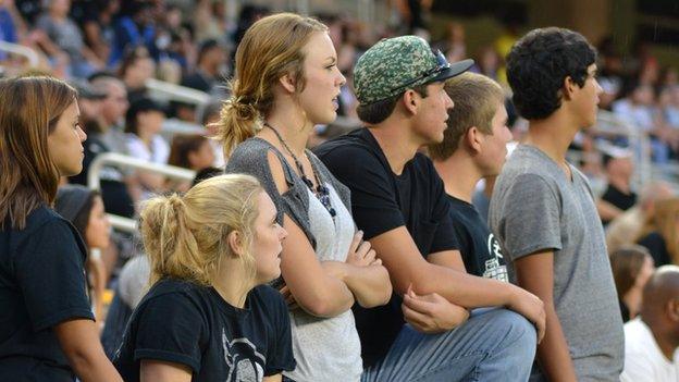 Fans watch a football game at Baylor's new stadium