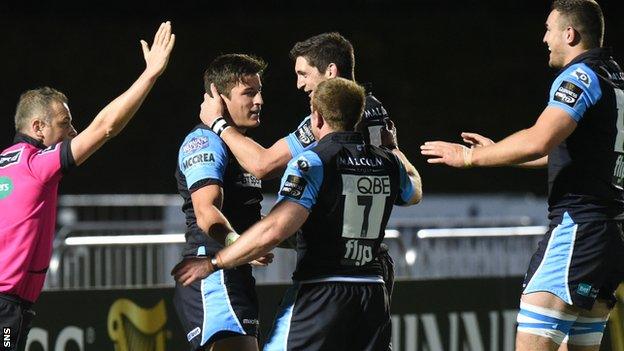 DTH Van Der Merwe (second left) celebrates his try for Glasgow Warriors