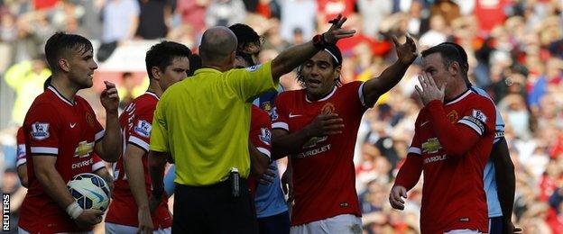 Manchester United striker Wayne Rooney (right) is sent off against West Ham