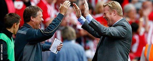 Manager Ronald Koeman (R) of Southampton celebrates their victory with assitant manager Erwin Koeman