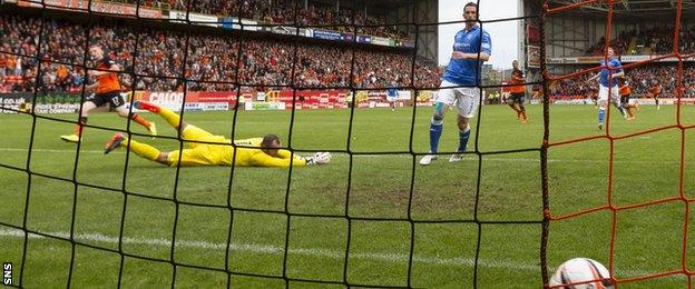 Chris Erskine slots the ball past Alan Mannus for the opening goal