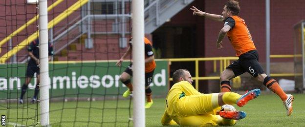 Paul Paton leaves St Johnstone goalkeeper Alan Mannus in despair