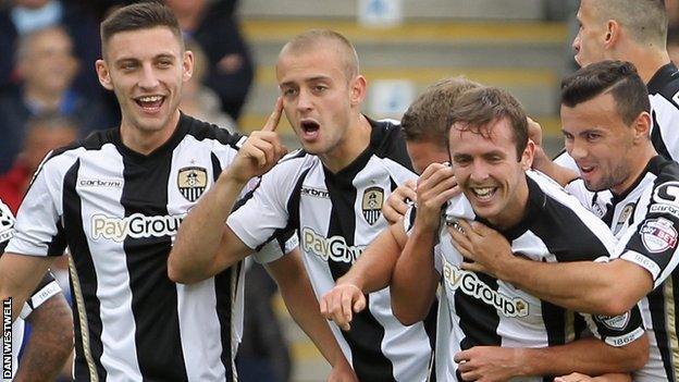 Notts County players celebrate Blair Adams' goal against Chesterfield