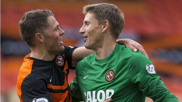 John Rankin and Radoslaw Cierzniak celebrate Dundee United's win