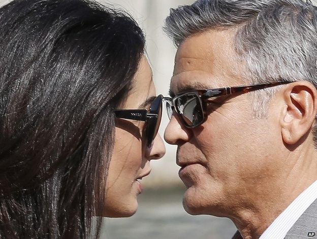 George Clooney and his fiancee Amal Alamuddin arrive in Venice, 26 September