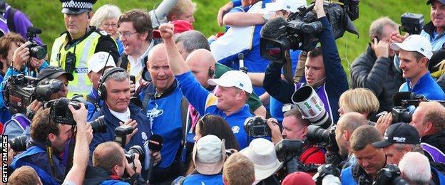 Jamie Donaldson celebrates on the 15th hole after Europe won the Ryder Cup with Donaldson defeating Keegan Bradley