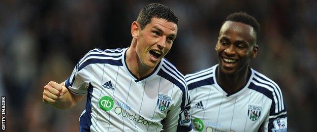 West Brom midfielder Graham Dorras celebrates scoring against Burnley