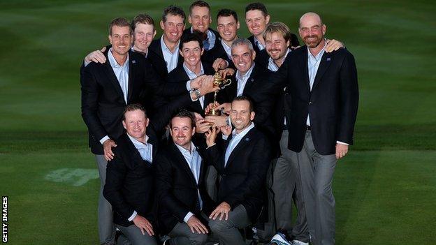 Europe pose with the Ryder Cup trophy after defeating the United States at Gleneagles