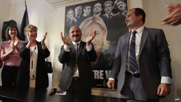 Frejus mayor David Rachline (R) of the far-right National Front (FN) is applauded after being elected senator in Toulon on 28 September 2014.