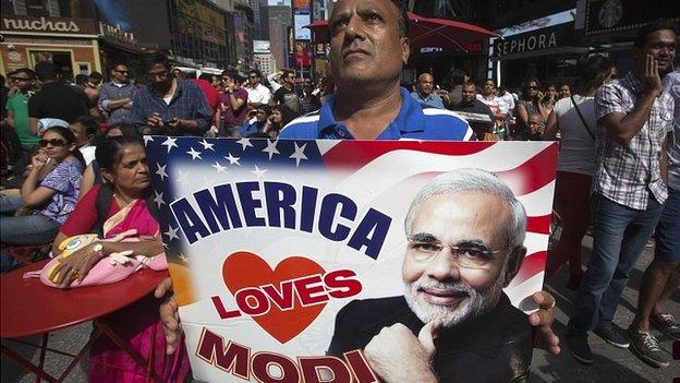 Supporter holds America Loves Modi sign in Times Square, New York. 28 Sept 2014