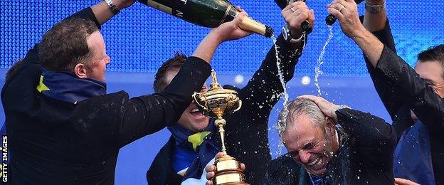 Paul McGinley soaked in champagne