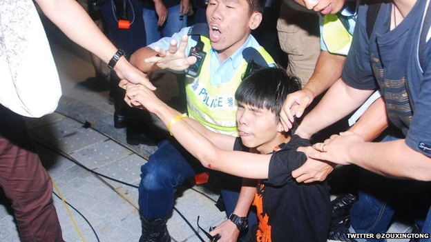 Joshua Wong being arrested