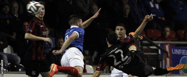 Paul Heatley fires Crusaders into the lead against Linfield